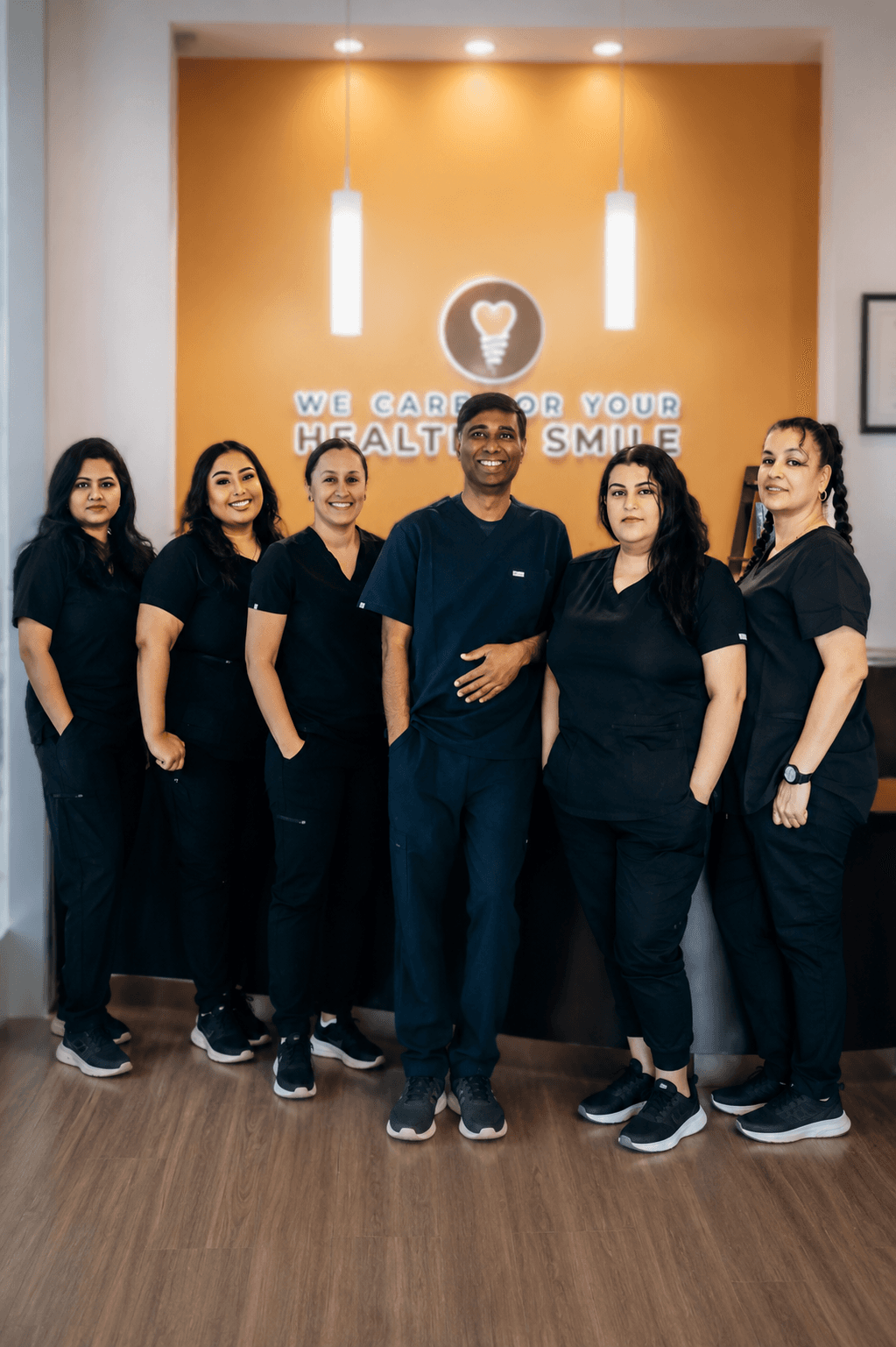 Professional dental care and smiling patient